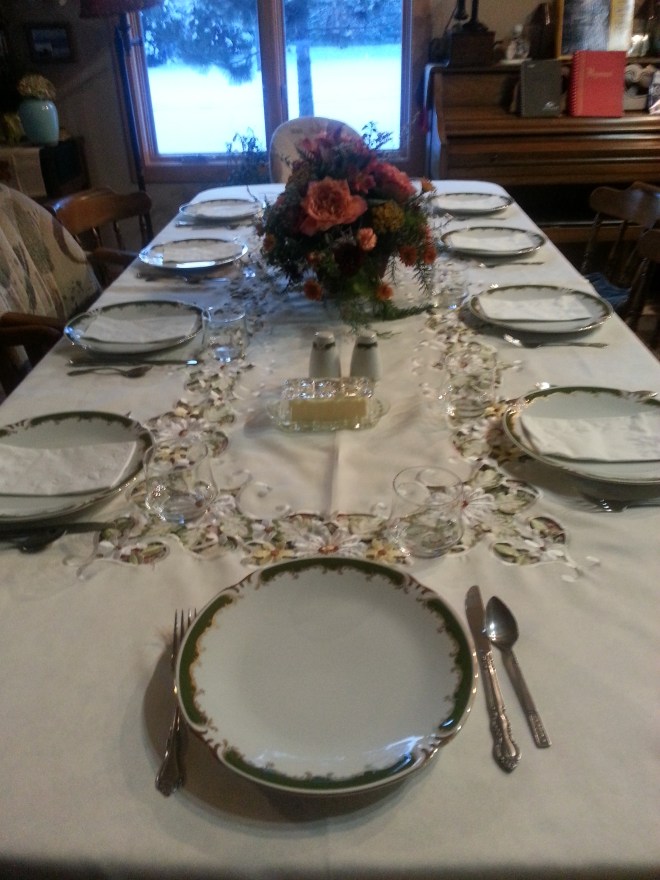 Before the feast - one of our two tables with Mom's birthday flowers as the centerpiece.