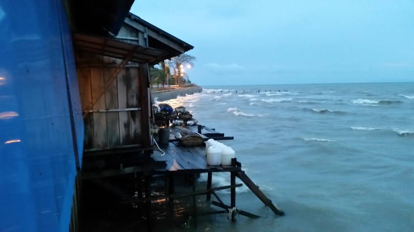 At Kimmly Seafood Restaurant in Kep, angry sea, beautiful night sky.